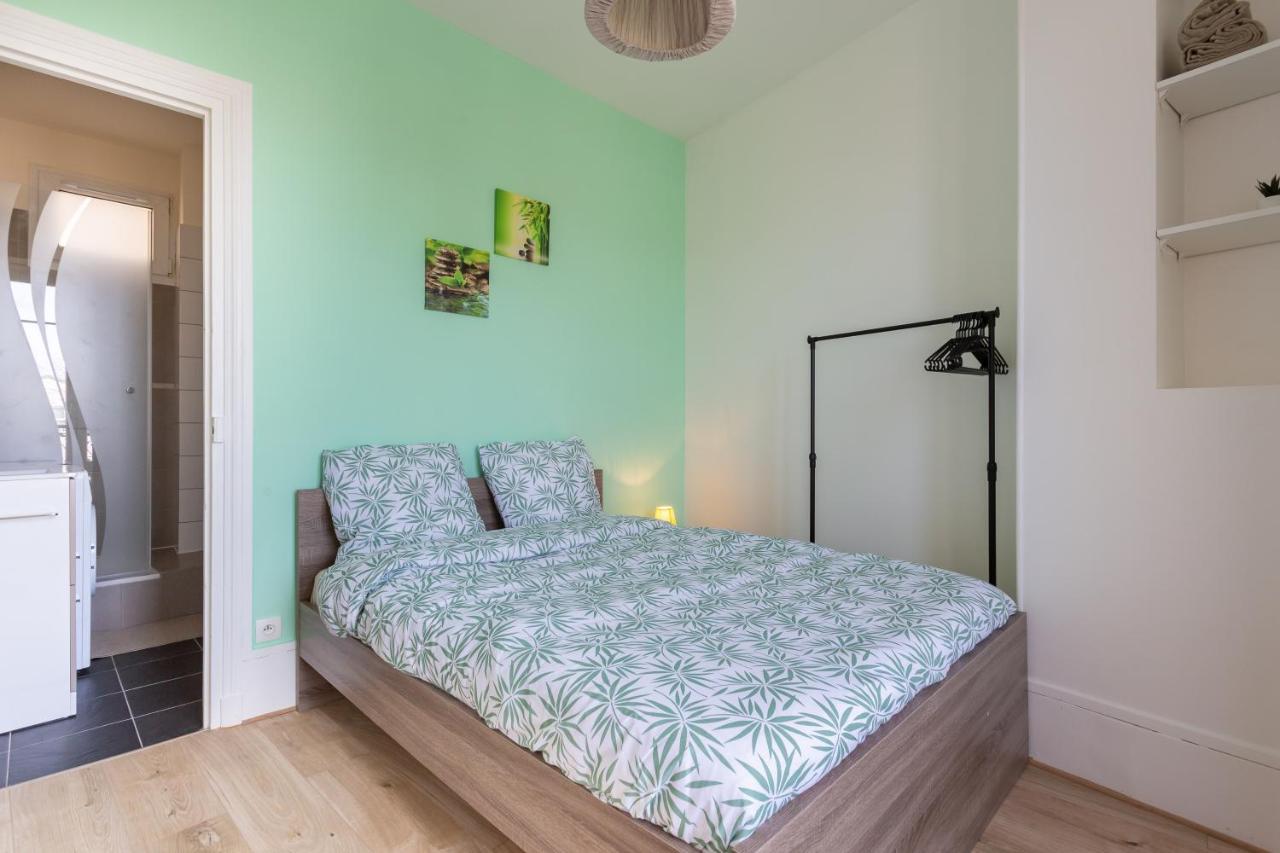 Le Charme Haussmannien-10 Min Paris Apartment อาร์ฌ็องเตย ภายนอก รูปภาพ